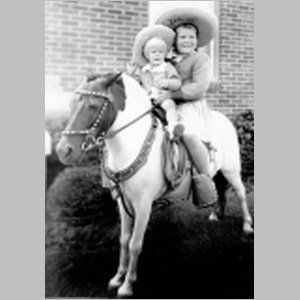 Pat_&_Deb_Kish_on_Pony_on_Prospect.html